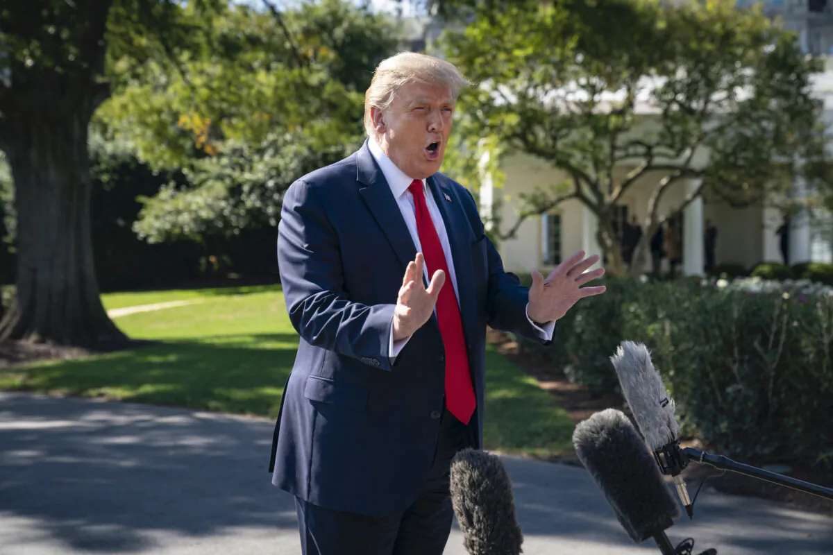 President Donald Trump speaks to reporters on his way to Marine One on the South Lawn of the White House in Washington on Sept. 30, 2020. (Drew Angerer/Getty Images)