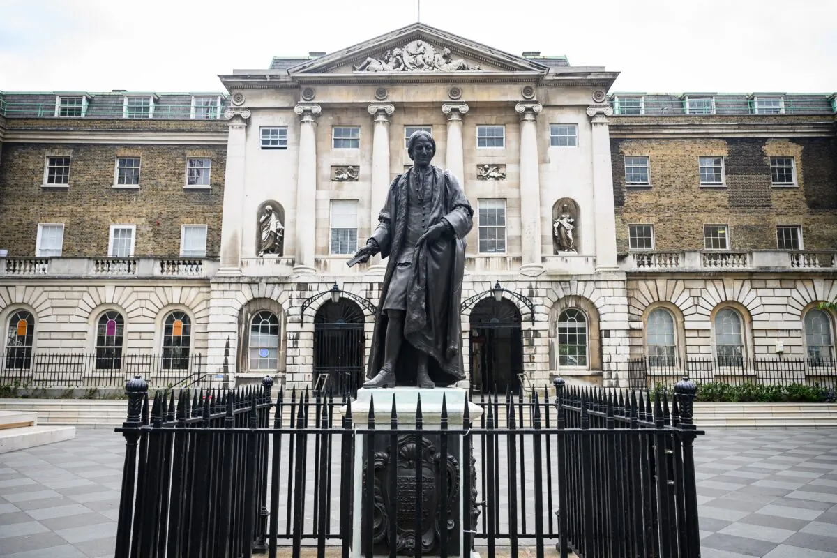 A statue of Sir Thomas Guy outside Guy's Hospital in London. Guy made his fortune through ownership of a very large amount of shares in the South Sea Co. (Leon Neal/Getty Images)