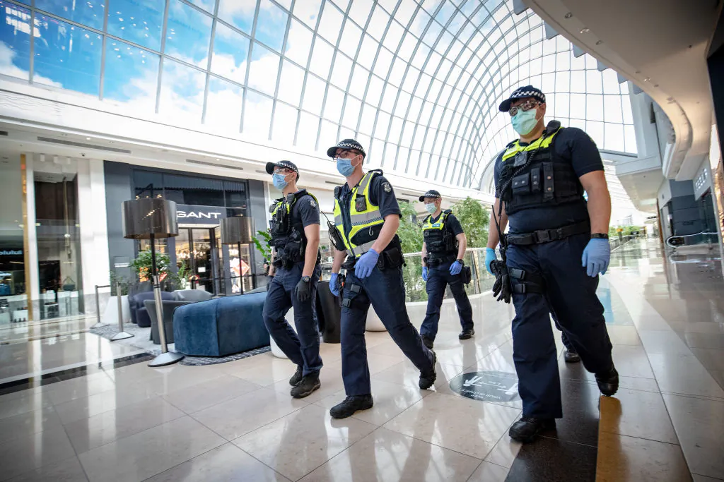 Members of Victoria Police patrol through Chadstone Shopping Centre on September 20, 2020 in Melbourne, Australia. (Darrian Traynor/Getty Images)