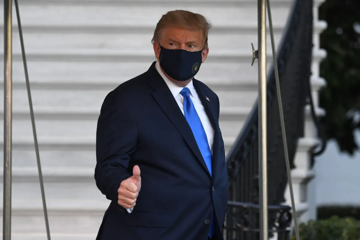 President Donald Trump walks to Marine One prior to departure from the South Lawn of the White House as he heads to Walter Reed Military Medical Center in Washington on Oct. 2, 2020. (Saul Loeb/AFP via Getty Images)