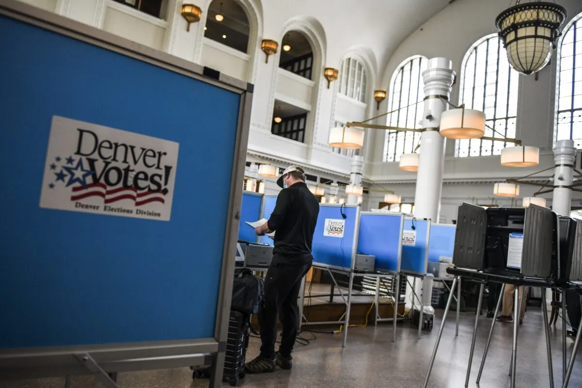 A man votes in Denver, Colo., on June 30, 2020. (Michael Ciaglo/Getty Images)