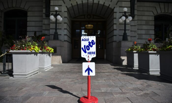 A voting sign sits outside the Union Station polling center in Denver, Colo., on June 30, 2020. (Michael Ciaglo/Getty Images)