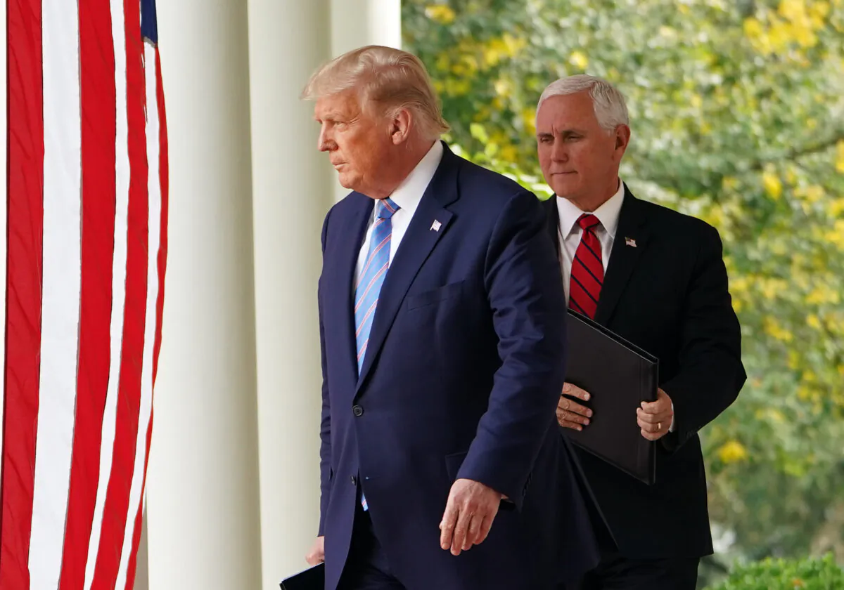 President Donald Trump and US Vice President Mike Pence arrive to speak on COVID-19 testing in the Rose Garden of the White House in Washington on Sept. 28, 2020. (Mandel Ngan/AFP via Getty Images)
