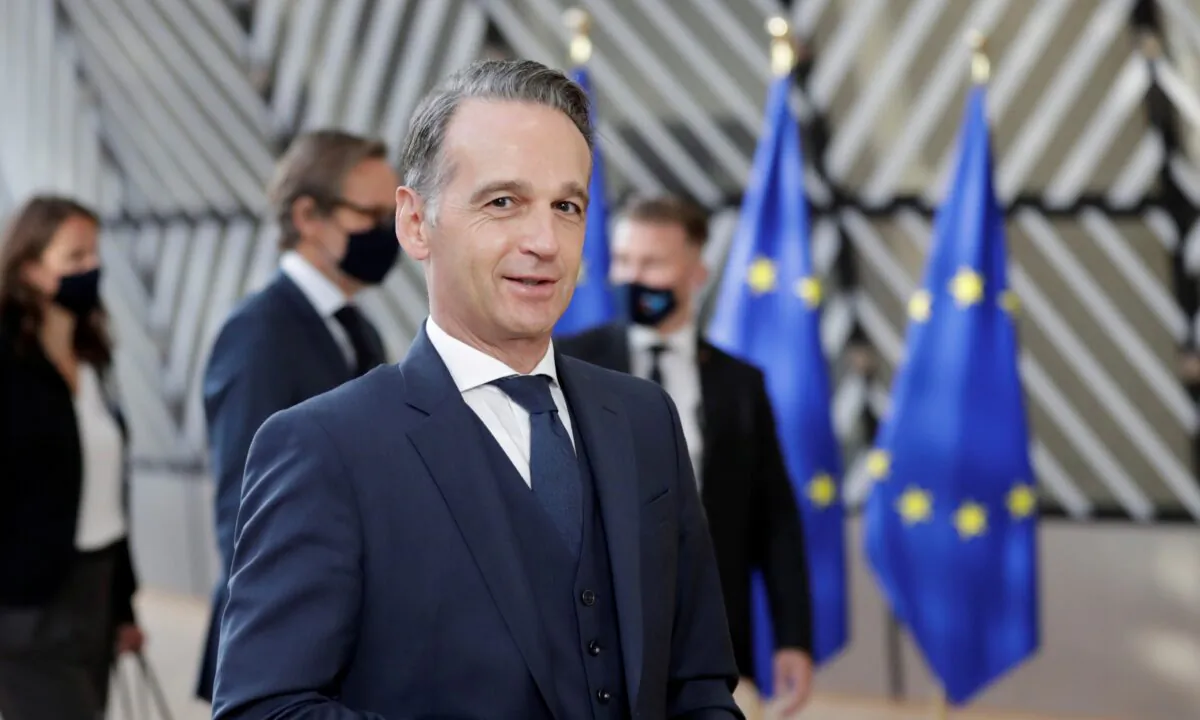 German Minister of Foreign Affairs Heiko Maas walks during the foreign affairs ministers council in Brussels, Belgium, on Sept. 21, 2020. (Olivier Hoslet/Pool via Reuters)