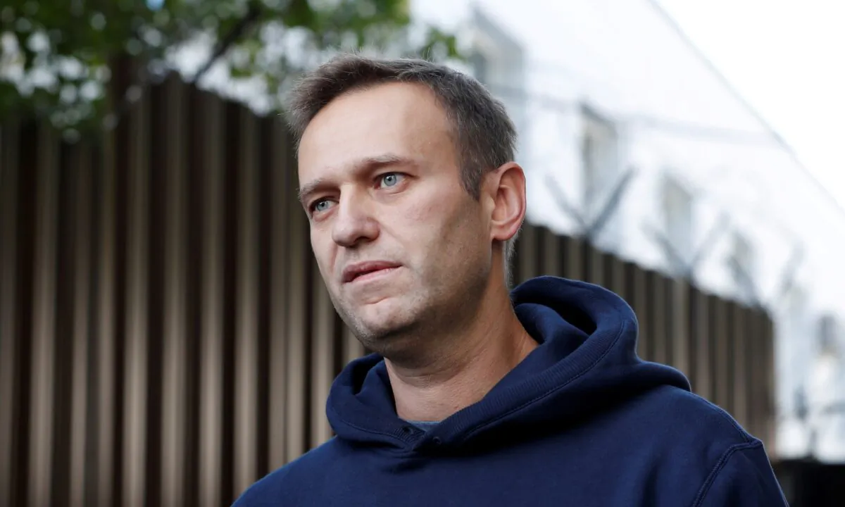 Russian opposition leader Alexei Navalny speaks with journalists after he was released from a detention centre in Moscow, Russia, on Aug. 23, 2019. (Evgenia Novozhenina/Reuters)