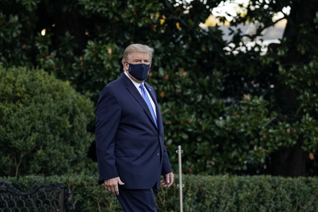 President Donald Trump leaves the White House for Walter Reed National Military Medical Center on the South Lawn of the White House in Washington on Oct. 2, 2020. (Drew Angerer/Getty Images)