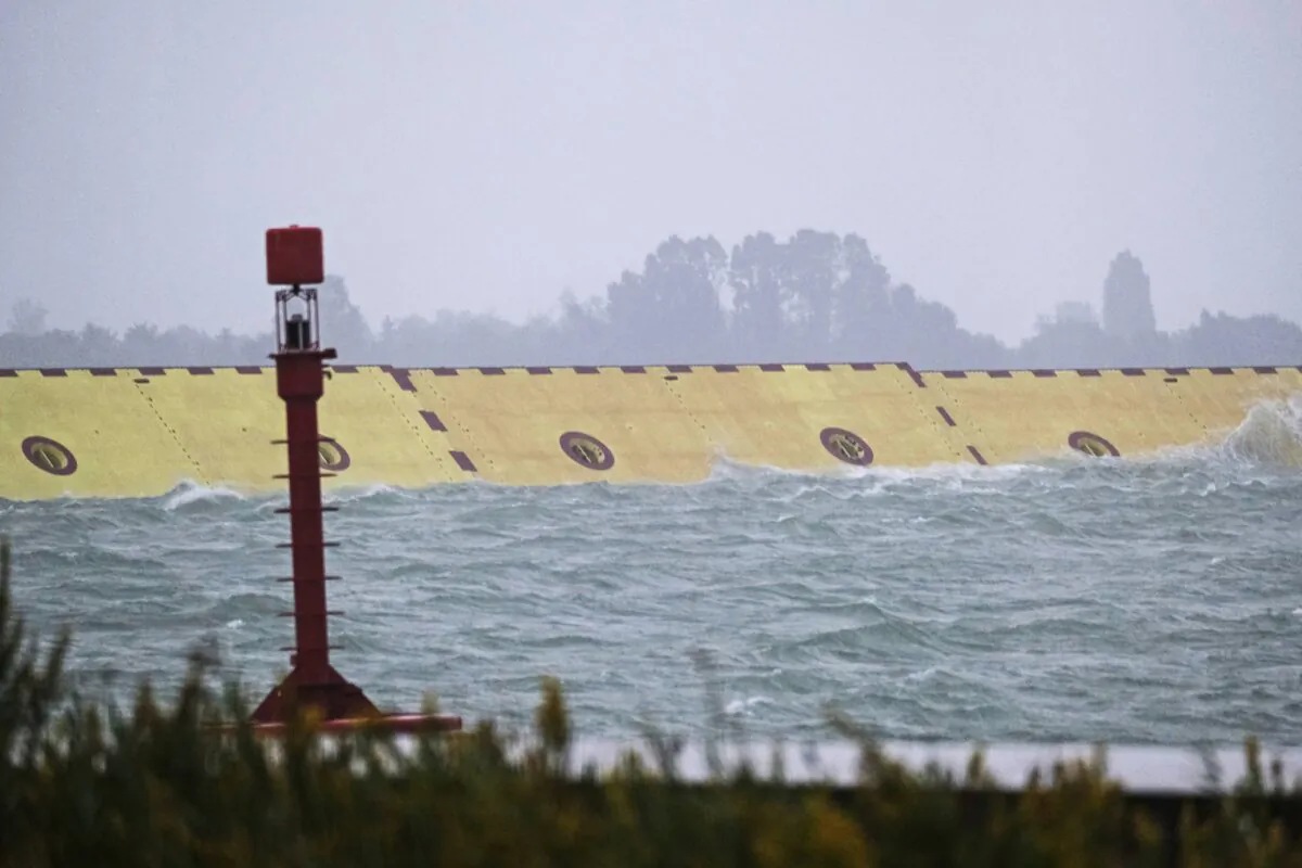 Mose flood barrier scheme is used for the first time, in Venice, Italy, on Oct. 3, 2020. (Manuel Silvestri/Reuters)