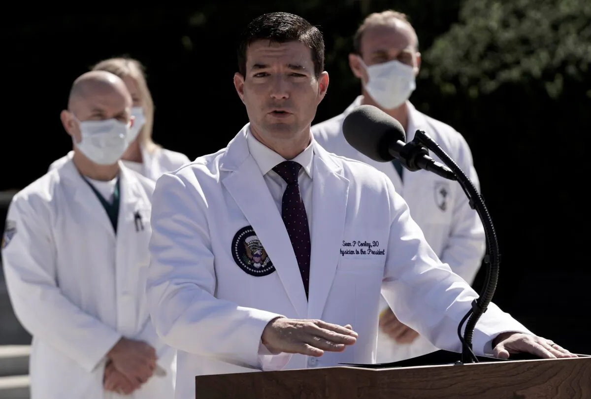 U.S. Navy Commander Dr. Sean Conley, the White House physician, talks to the media about President Donald Trump's health after the president was hospitalized for COVID-19 treatment, at Walter Reed National Military Medical Center, in Bethesda, Md., on Oct. 3, 2020. (Ken Cedeno/Reuters)