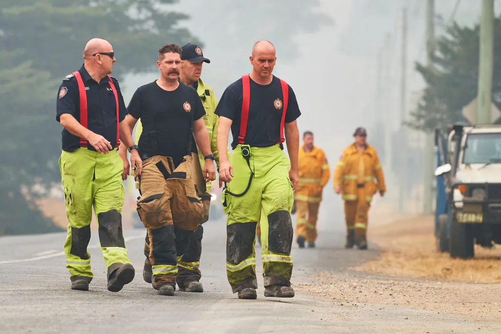 Fire Rescue Queensland crews are pictured in Wingello, Australia on Jan. 5, 2020. (Brett Hemmings/Getty Images)