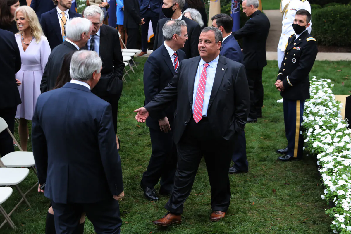 Former New Jersey Governor Chris Christie (C) talks with guests in the Rose Garden after President Donald Trump introduced 7th U.S. Circuit Court Judge Amy Coney Barrett, 48, as his nominee to the Supreme Court at the White House on Sept. 26, 2020. (Chip Somodevilla/Getty Images)