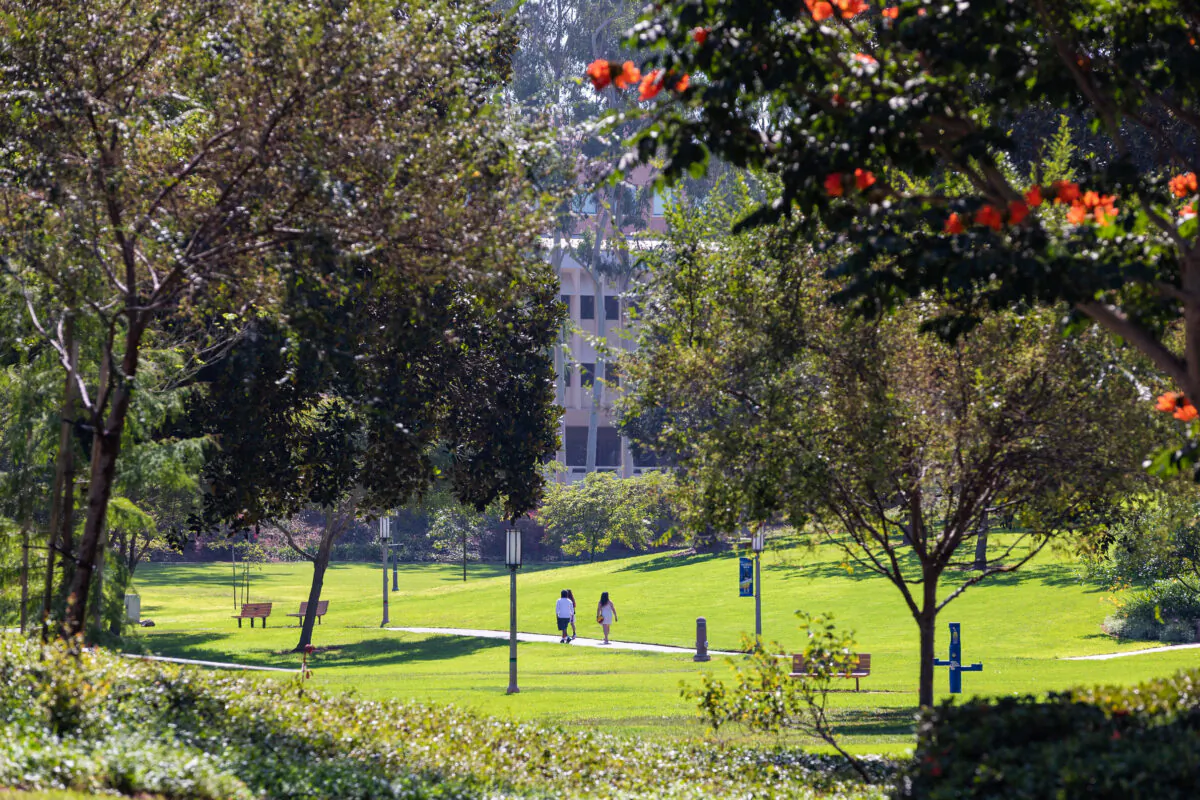Students walk through the University of California–Irvine campus in Irvine, Calif., on Sept. 25, 2020. (John Fredricks/The Epoch Times)