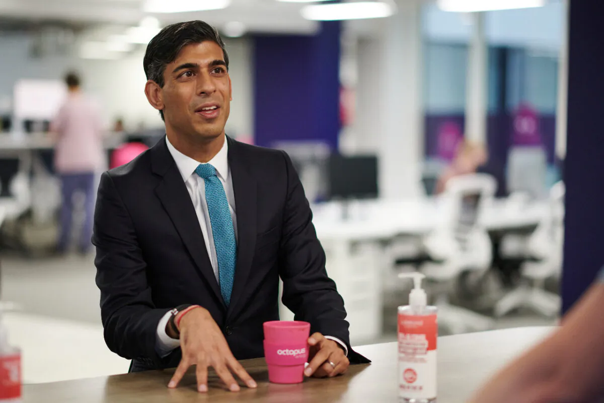 Britain's Chancellor of the Exchequer Rishi Sunak visits the headquarters of Octopus Energy, in London on Oct. 5, 2020. (Leon Neal/Pool via Reuters)
