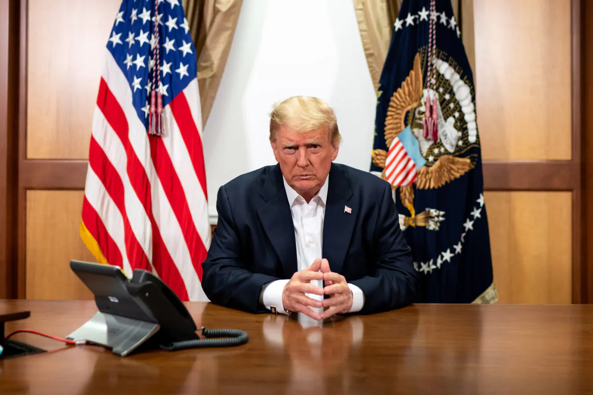 President Donald Trump participates in a phone call with Vice President Mike Pence, Secretary of State Mike Pompeo, and Chairman of the Joint Chiefs of Staff Gen. Mark Milley in his conference room at Walter Reed National Military Medical Center in Bethesda, Md. on Oct. 4, 2020. (Official White House Photo by Tia Dufour)