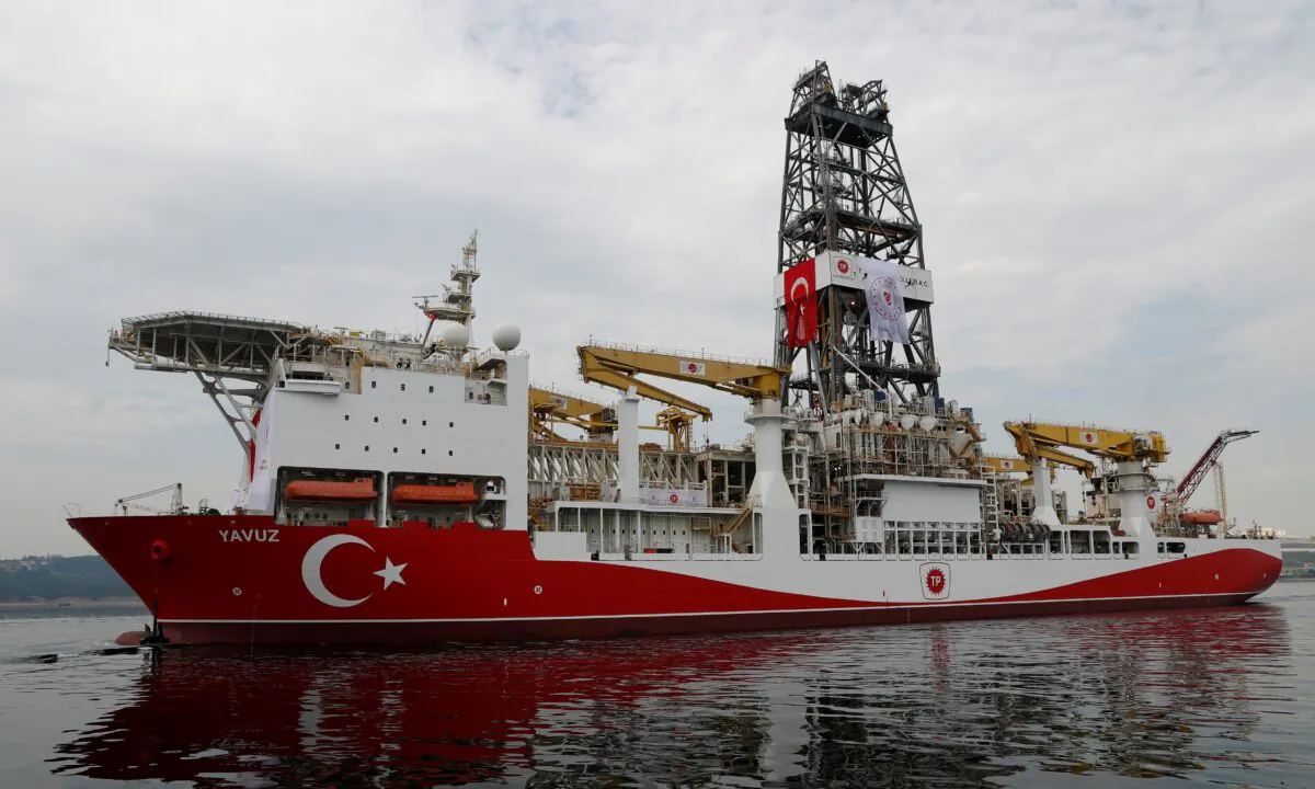 Turkish drilling vessel Yavuz sets sail in Izmit Bay, on its way to the Mediterranean Sea, off the port of Dilovasi, Turkey, on June 20, 2019. (Sezer/Reuters)