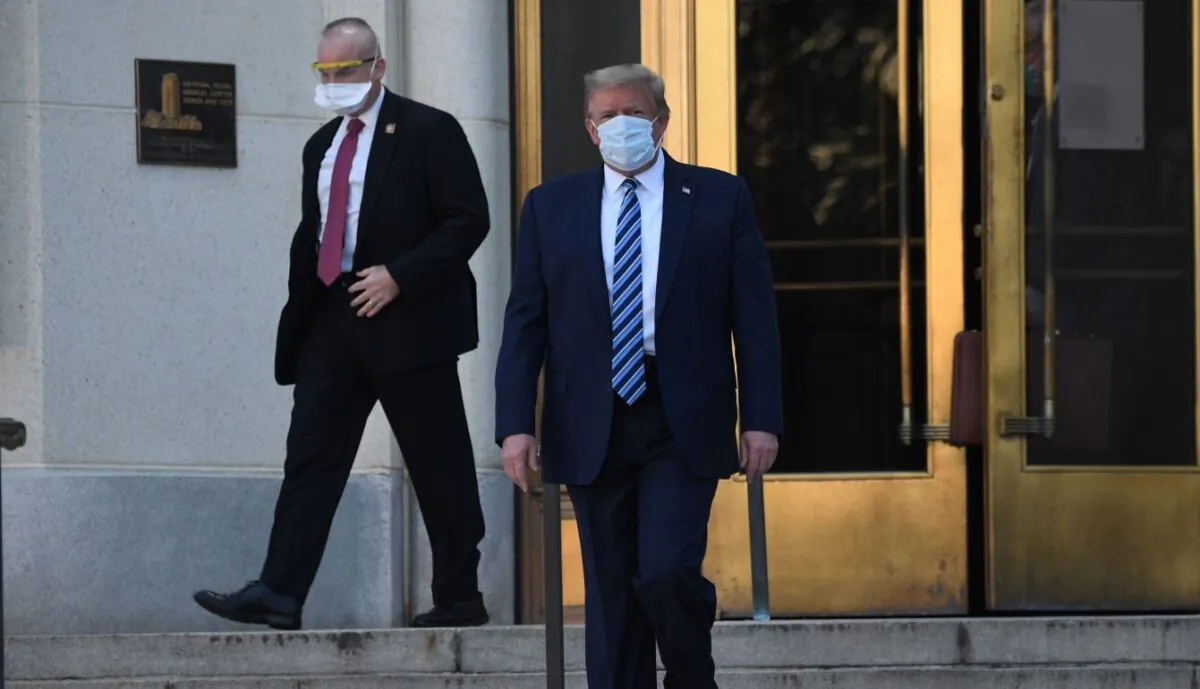 President Donald Trump walks to Marine One at Walter Reed Medical Center in Bethesda, Md., on Oct. 5, 2020. (Saul Loeb/AFP via Getty Images)