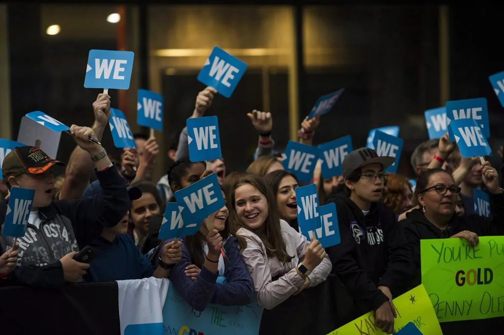 A crowd gathers before the WE Day red carpet in Toronto on Sept. 20, 2018. (Christopher Katsarov/The Canadian Press)