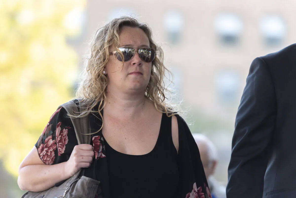 Carolyn Strom, left, arrives at the Court of Appeal for Saskatchewan in Regina, Saskatchewan on September 17, 2019. Strom was found guilty of professional misconduct by the Saskatchewan Registered Nurses Association in 2016 and handed the financial penalty. That ruling was reversed on Oct. 6, 2020. (THE CANADIAN PRESS/Michael Bell)