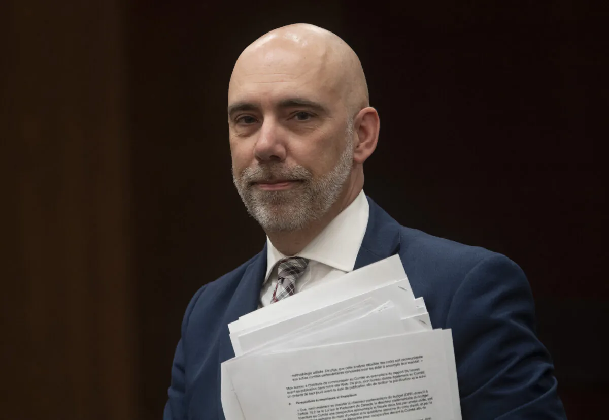 Parliamentary Budget Officer Yves Giroux waits to appear before the Commons Finance committee on Parliament Hill in Ottawa on March 10, 2020. (Adrian Wyld/The Canadian Press)