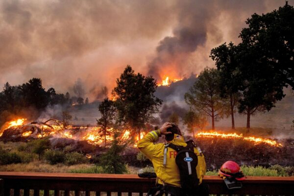 A firefighter watches the LNU Lightning Complex fires
