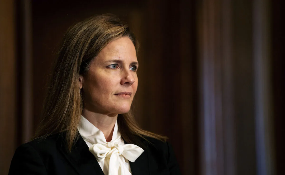 Judge Amy Coney Barrett, President Donald Trump's nominee for the Supreme Court, meets with Sen. Josh Hawley (R-Mo.) on Capitol Hill in Washington, on Oct. 1, 2020. (Demetrius Freeman/The Washington Post via AP, Pool)