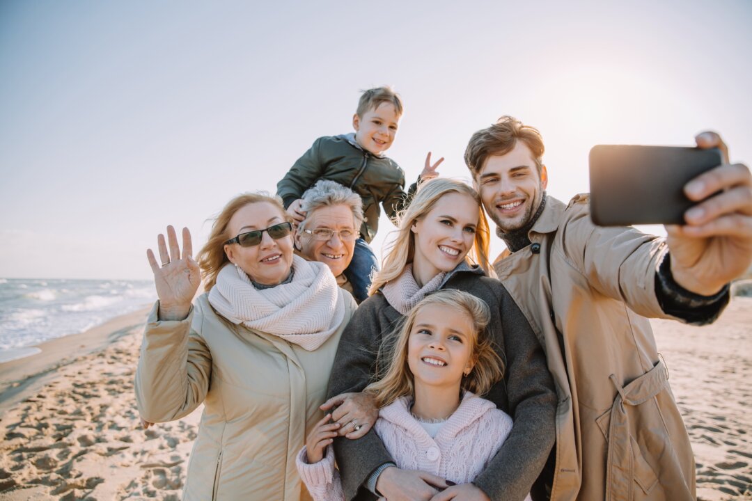 Having grandparents and children together under one roof is a great chance to make some memories and get to know eachother. (LightField Studios/Shutterstock)