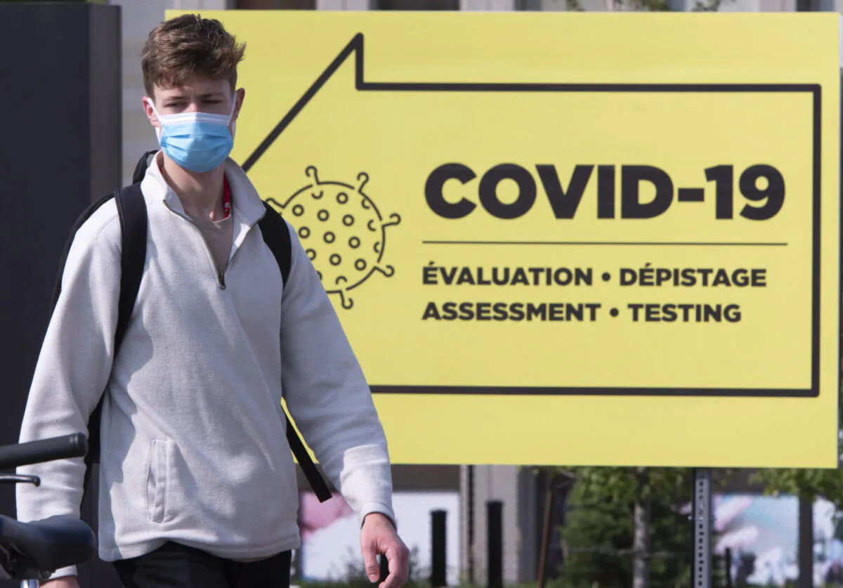 A man leaves a COVID-19 testing clinic on October 6, 2020  in Montreal. (THE CANADIAN PRESS/Ryan Remiorz)
