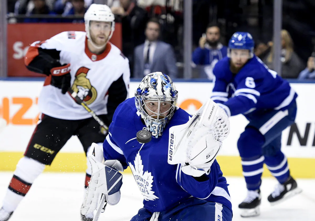Toronto Maple Leafs goaltender Frederik Andersen (31) makes a glove save during first period NHL hockey action against the Ottawa Senators, in Toronto on Wednesday, October 2, 2019. (The Canadian Press/Nathan Denette)