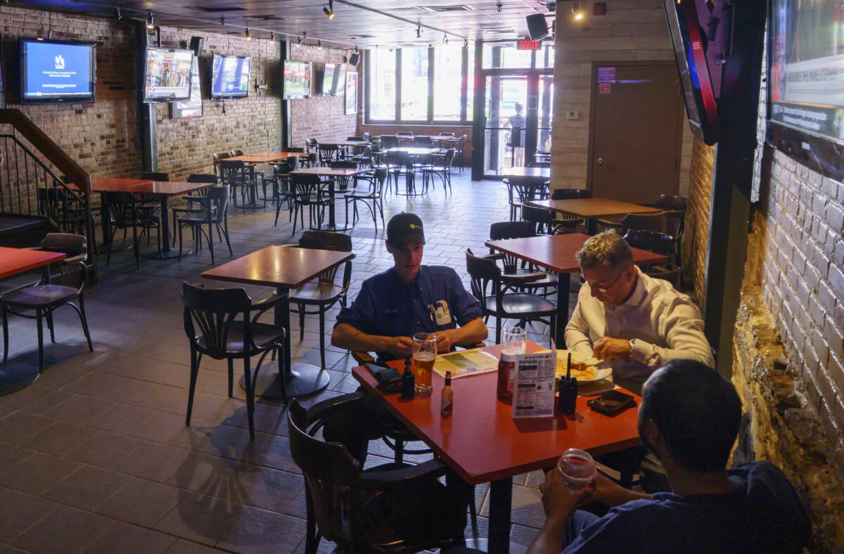 A near-empty bar is seen in Montreal, on July 9, 2020. (Paul Chiasson/The Canadian Press)