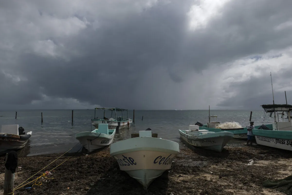 Boats sit closer to the shore after they were secured by fishermen preparing for the arrival of Hurricane Delta in Puerto Juarez, Cancun, Mexico, on Oct. 6, 2020. (Victor Ruiz Garcia/AP Photo)