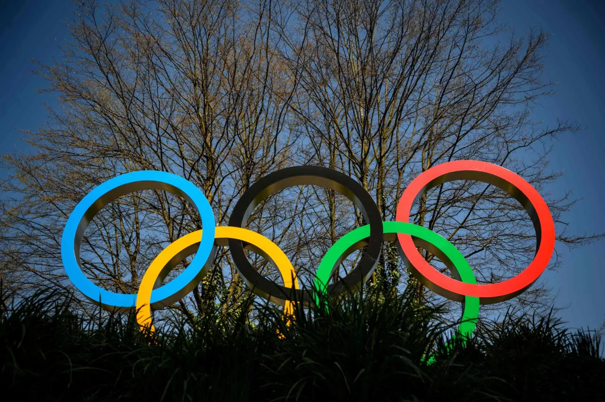 The Olympic Rings logo is pictured in front of the headquarters of the International Olympic Committee (IOC) in Lausanne on March 18, 2020. (Fabrice Coffrini /AFP via Getty Images)