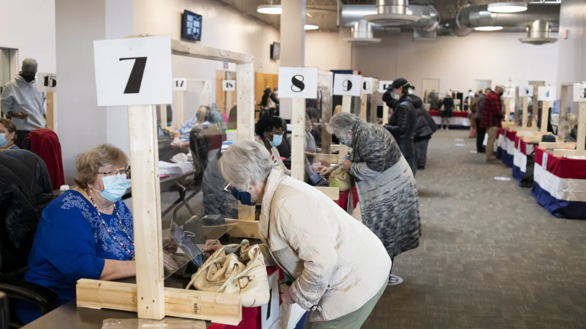 People register for early voting inside of the of the Franklin County Board of Elections Office on Oct. 6, 2020 in Columbus, Ohio. (Ty Wright/Getty Images)
