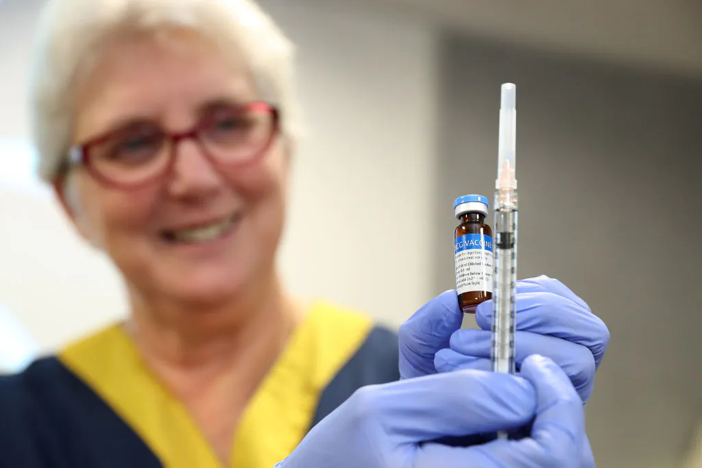 A clinical staff member holds a BCG vial and syringe in the trial clinic at Sir Charles Gairdner hospital on April 20, 2020 in Perth, Australia. (Paul Kane/Getty Images)