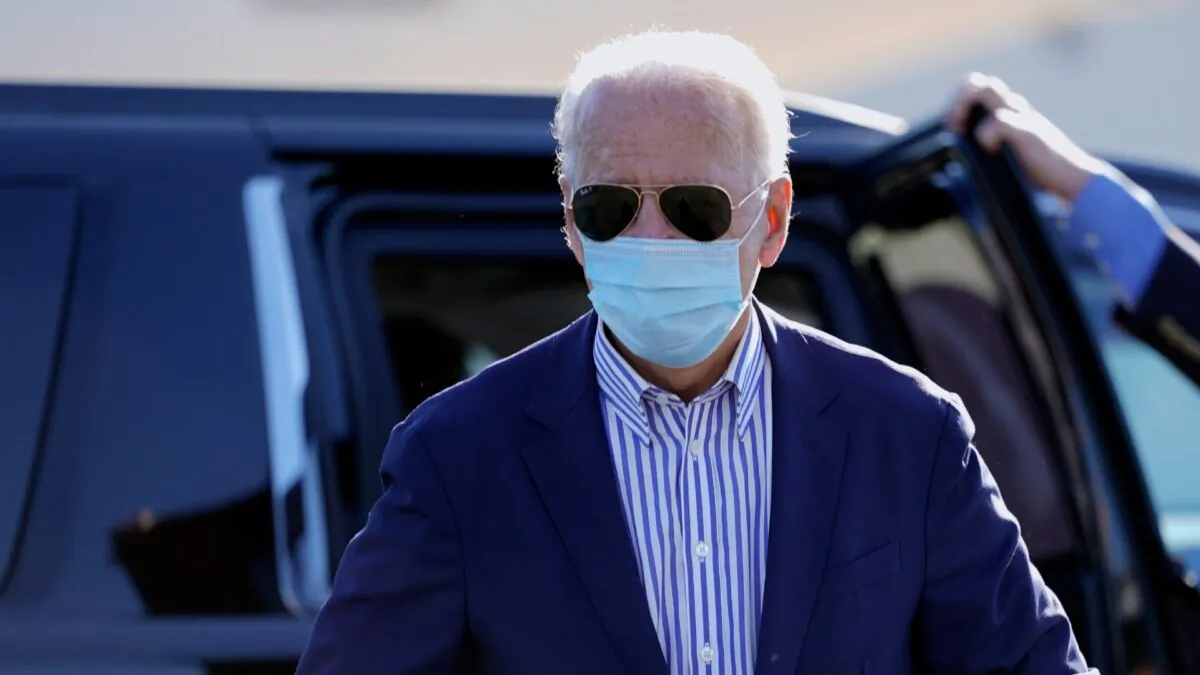 Democratic presidential nominee Joe Biden walks to board his campaign plane at New Castle Airport in New Castle, Del., on Oct. 8, 2020. (Carolyn Kaster/AP Photo)