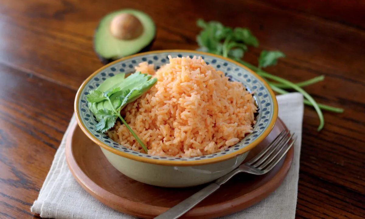 An essential side dish found on plates throughout Mexico, this red rice can accompany almost any meal. (Courtesy of Mely Martinez)