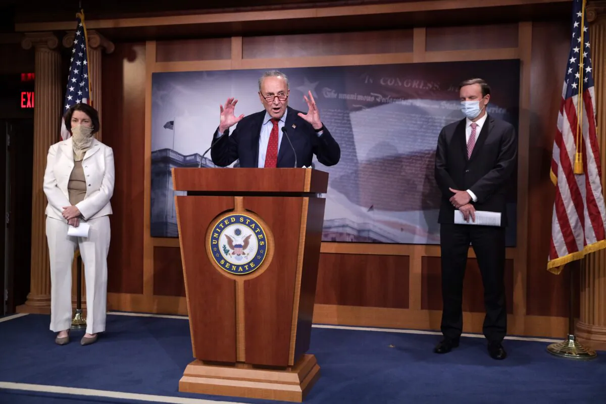 U.S. Senate Minority Leader Sen. Chuck Schumer (D-N.Y.) speaks as Sen. Amy Klobuchar (D-Minn.) and Sen. Chris Murphy (D-CT) listen during a news conference at the U.S. Capitol August 4, 2020 in Washington, DC. Senate Democrats held a weekly news conference to answer questions from members of the press. (Photo by Alex Wong/Getty Images)