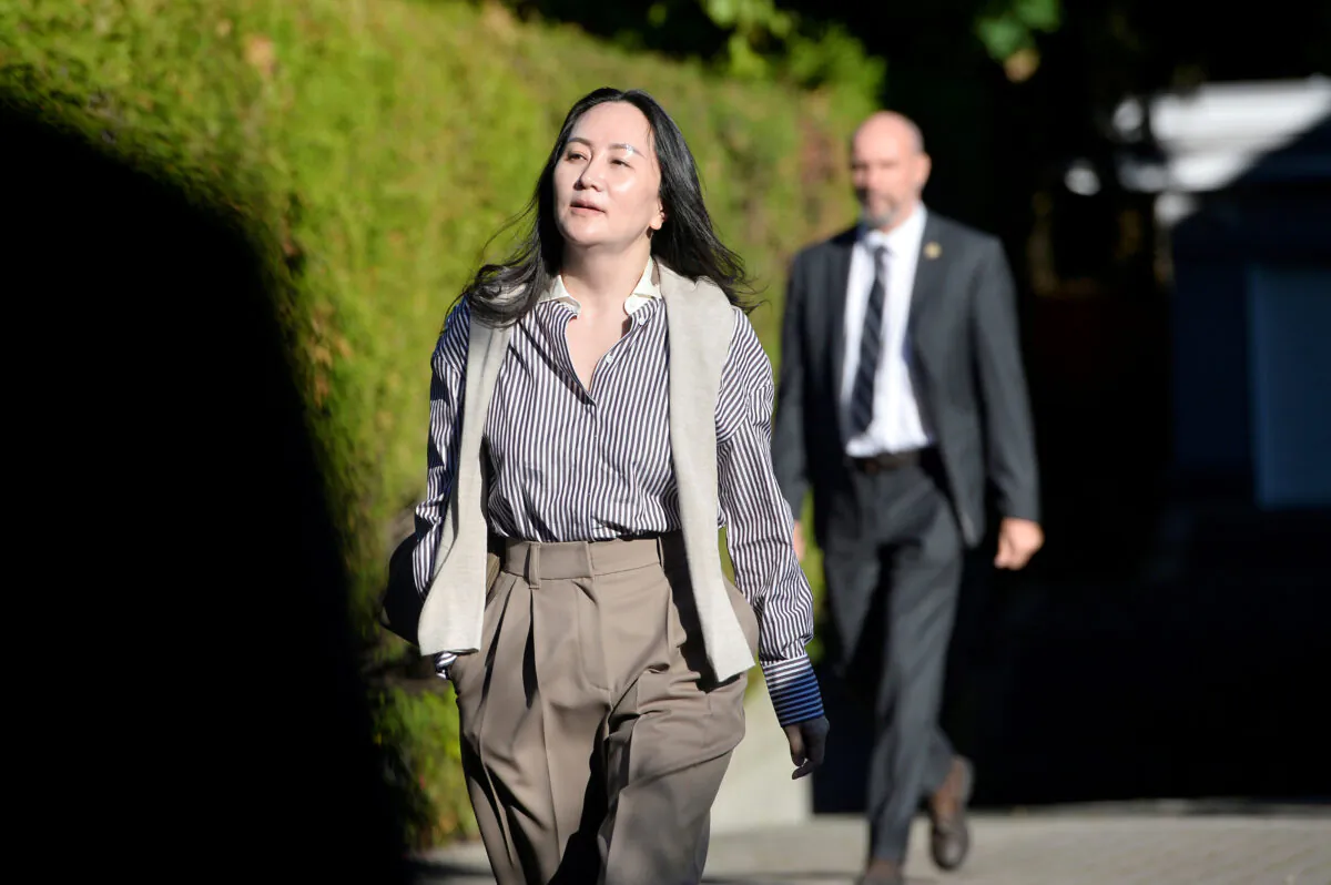 Huawei Technologies Chief Financial Officer Meng Wanzhou leaves her home to attend a court hearing in Vancouver, B.C., on Sept. 28, 2020. (REUTERS/Jennifer Gauthier/File Photo)