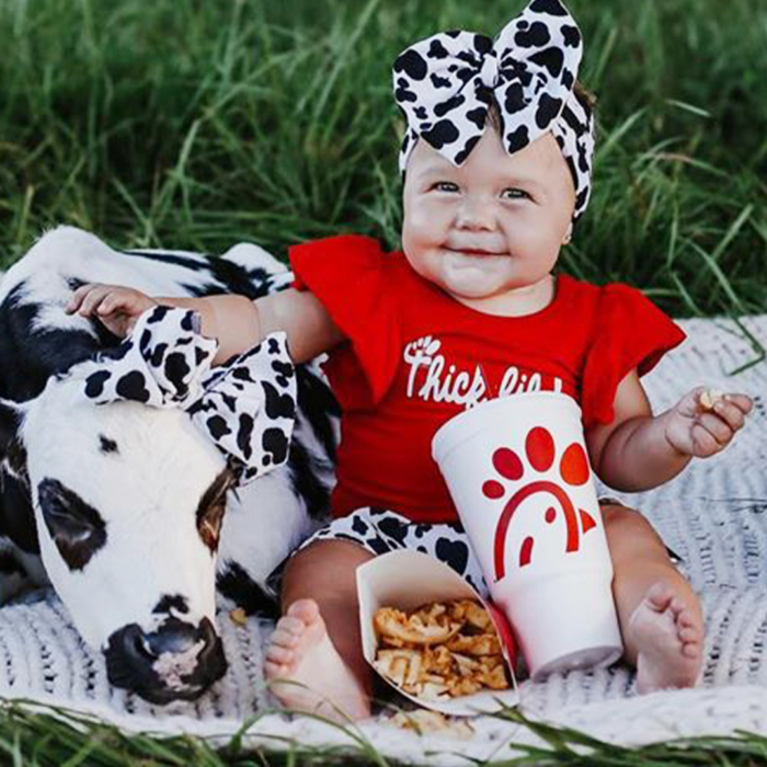 Florida baby, rescued calf delight social media with Chick-fil-A photoshoot