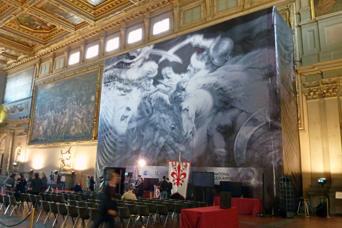 A 2012 view of a banner showing the painting which might be hidden behind the Vasari wall at its location in Florence's Palazzo Vecchio. Art sleuths taking part in the controversial  research, partly sponsored by National Geographic, said on March 12, 2012 that they believe they had found traces of a Leonardo da Vinci masterpiece that had not been seen in over four centuries. (DARIO THUBURN/AFP via Getty Images)