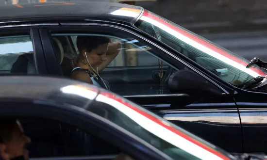 Wearing Earbuds on Dead Cellphone Still Considered Distracted Driving, BC Supreme Court Says