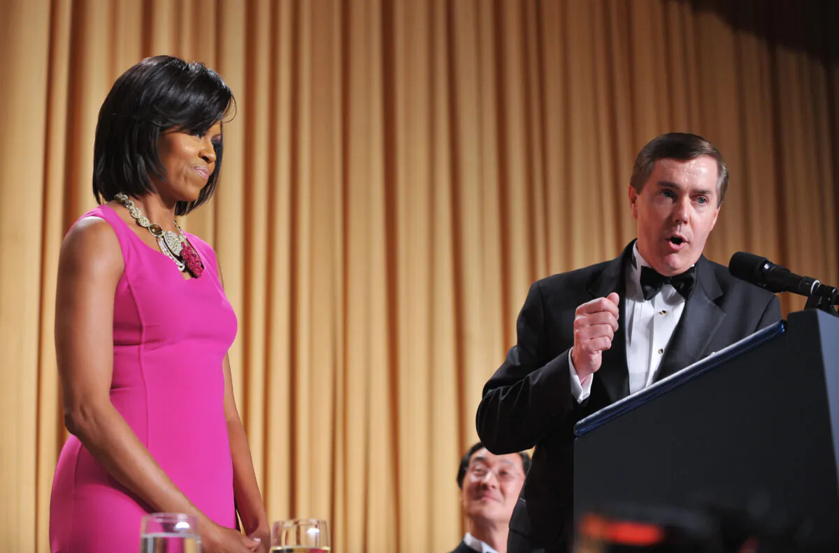 Steve Scully of C-SPAN, right, speaks during the White House Correspondents Association dinner as then-First Lady Michelle Obama listens, at the Washington Hilton hotel in Washington on May 9, 2009. (Mandel Ngan/AFP via Getty Images)