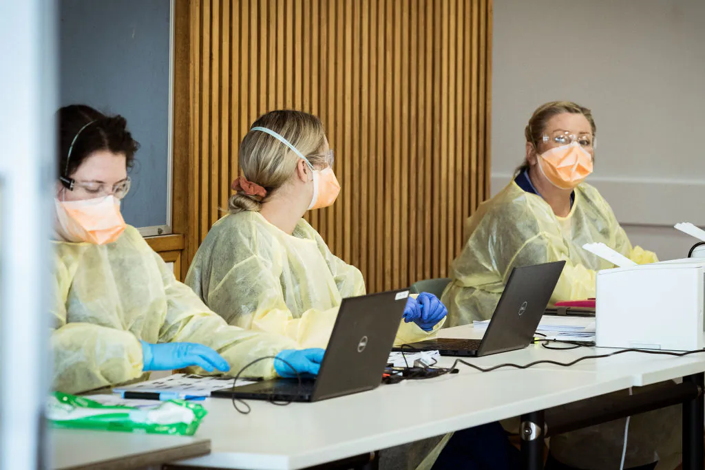 Medical professionals are seen at Kilmore Soldiers Memorial Hall in Kilmore, Australia on Oct. 10, 2020. (Darrian Traynor/Getty Images)
