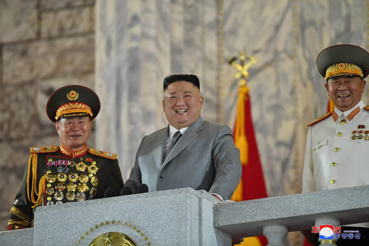 North Korean leader Kim Jong Un reacts as he attends a parade to mark the 75th anniversary of the founding of the ruling Workers' Party of Korea, in this image released by North Korea's Central News Agency on Oct. 10, 2020. (KCNA via Reuters)