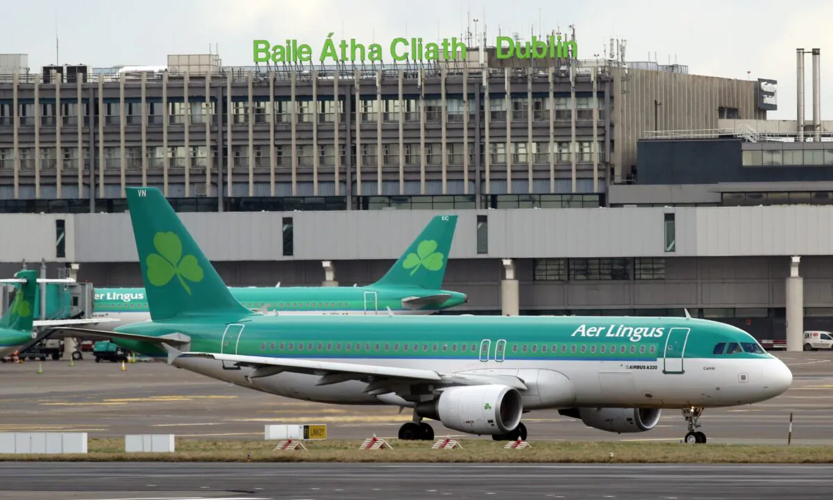 Aer Lingus passenger jets taxi at Dublin Airport in Ireland, on Jan. 27, 2015. (Paul Faith/AFP via Getty Images)
