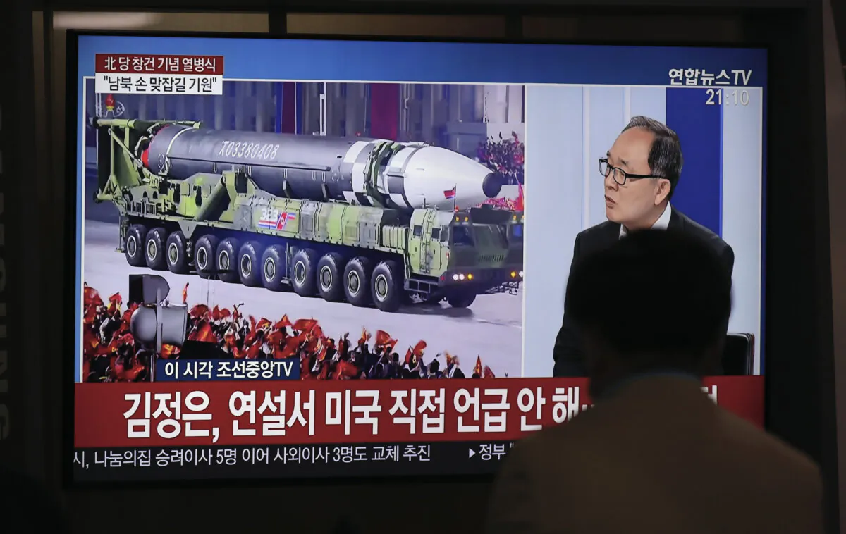 A man watches a TV screen during a news program reporting about the military parade to mark the 75th founding anniversary of the North Korea's ruling Workers’ party, at the Seoul Railway Station in Seoul, South Korea, on Oct. 10, 2020. (Lee Jin-man/AP Photo)