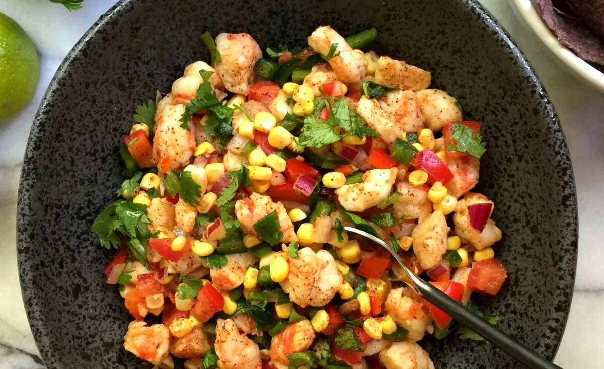 Bright in both color and flavor, this shrimp salsa is guaranteed to steal the show. (Lynda Balslev for TasteFood)