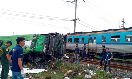 20 Killed on Temple Trip in Thailand as Bus, Train Collide
