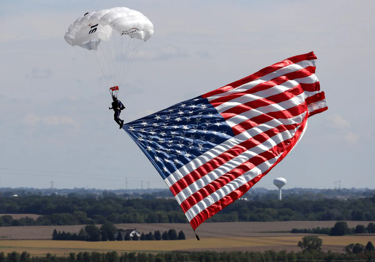 The American Flag is flown in to Chicagoland Speedway in Joliet, Ill., on Sept. 18, 2016.  (Jonathan Daniel/Getty Images)