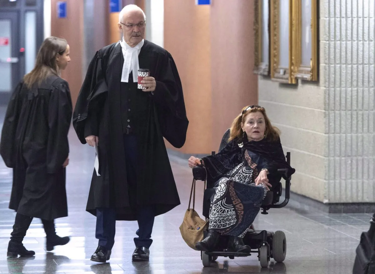 Nicole Gladu and her lawyer Jean-Pierre Menard arrive at the courthouse in Montreal on Jan. 7, 2019, for the beginning of a trial challenging the provincial and federal laws on medically assisted death on the grounds that they are too restrictive. (The Canadian Press/Paul Chiasson)