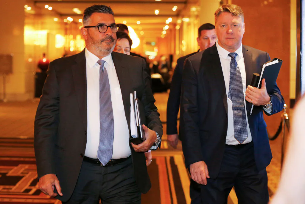 Andrew Demetriou (L) and Michael Johnston (R), non executive Directors of Crown, leaves the Crown Resorts AGM on October 24, 2019 in Melbourne, Australia. (Daniel Pockett/Getty Images)