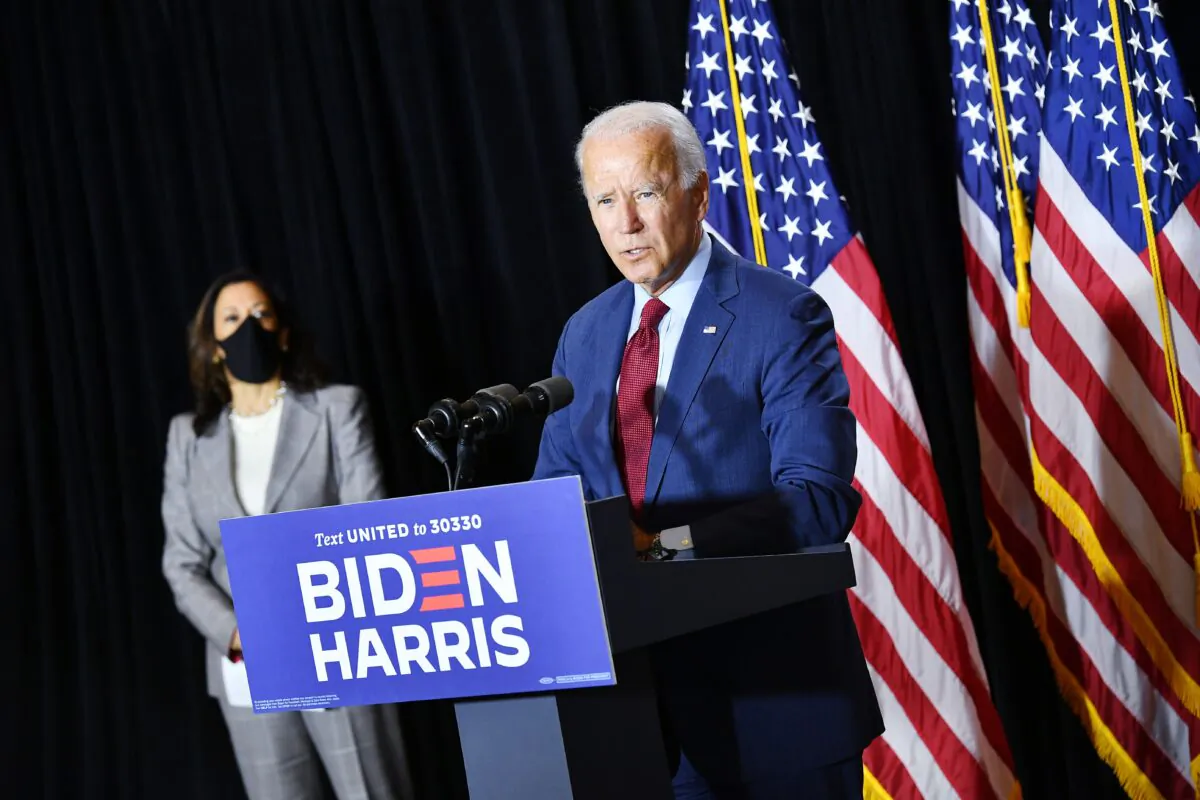 Vice presidential running mate, Sen. Kamala Harris, looks on as Democratic presidential nominee, former Vice President Joe Biden, holds a press conference in Wilmington, Del., on Aug. 13, 2020. (Mandel Ngan/AFP via Getty Images)